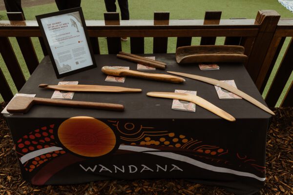 Artefacts handcrafted by Wandana team member Uncle Graham Morgan, a proud Wiradjuri and Yuwaalaraay man, presented to Glen Hurley and the Affinity Education team as a gift in celebration of NAIDOC Week and our ongoing partnership and shared commitment to working together