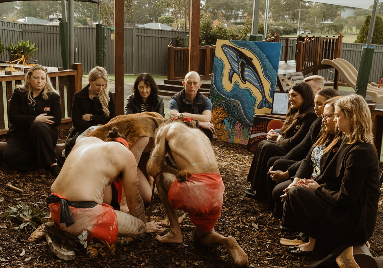 Wandana Aboriginal Education team performing a smoking ceremony at Kids Academy Glenmore Park