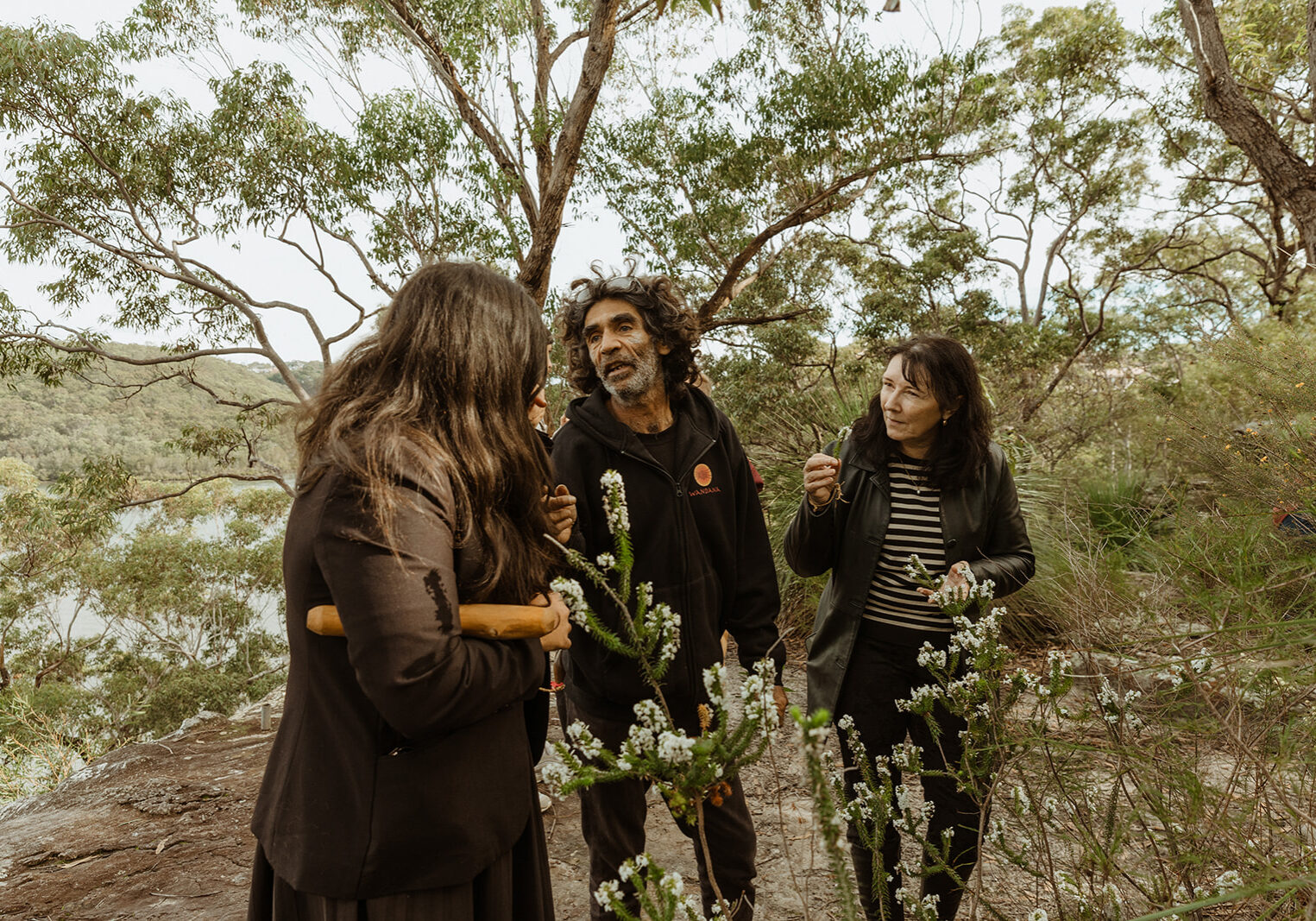 Affinity Education Chief People Officer Tracie Mackie, Education Project Advisor Jess Mitchell, and Uncle Les from Wandana Aboriginal Education on Dharug Country